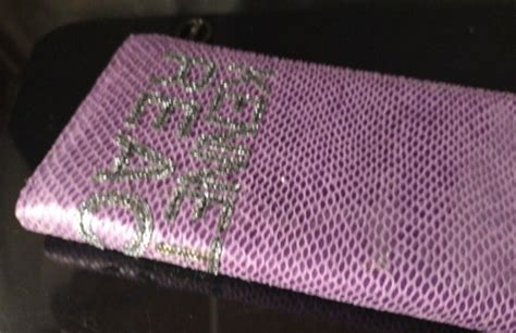 purple snakeskin wallets.